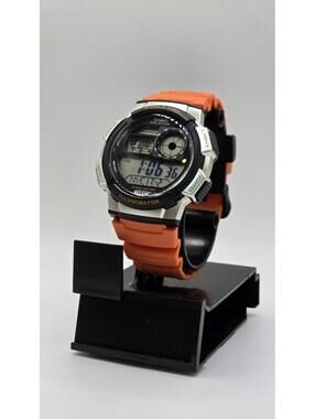 Casio Men’s Digital Watch with Black Dial & Orange Strap - AE1000W-4BV